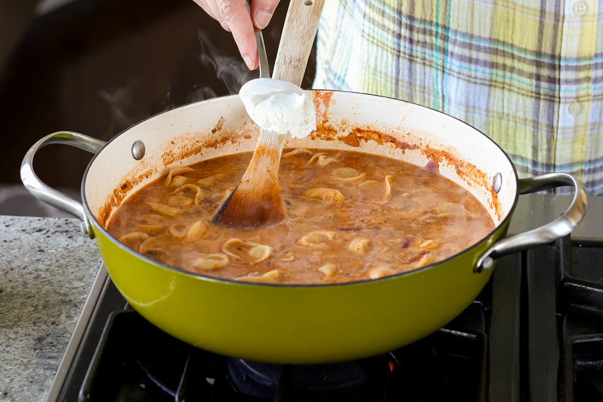 adding the cream element to the pan