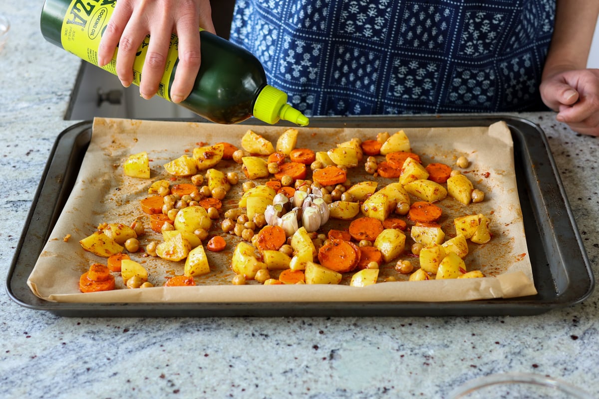adding oil to the veggies before roasting