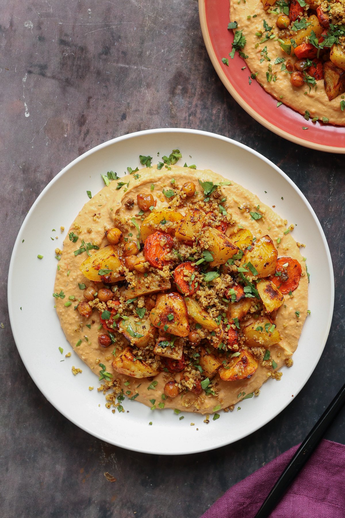harissa bean puree topped with roasted vegetables and baharat walnuts