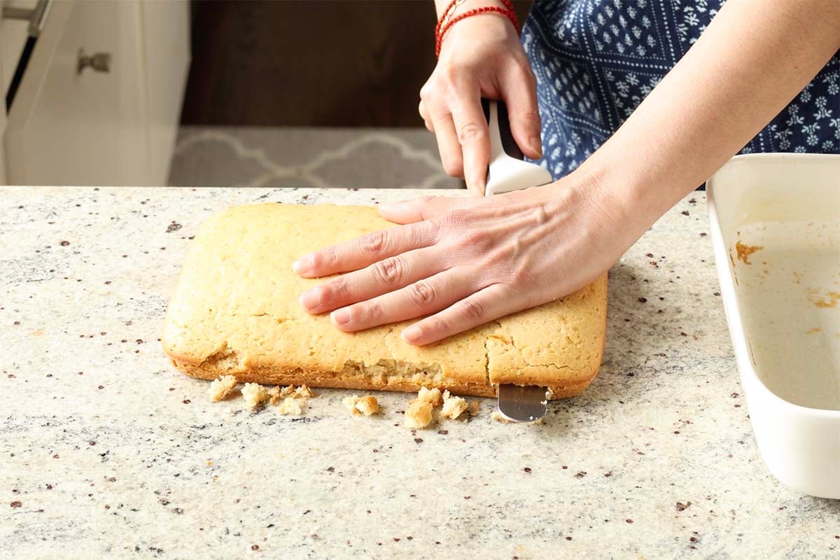 slicing the cake in half