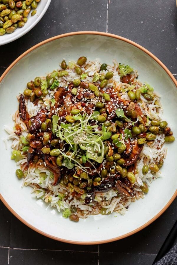 crispy edamame bowl on a black table