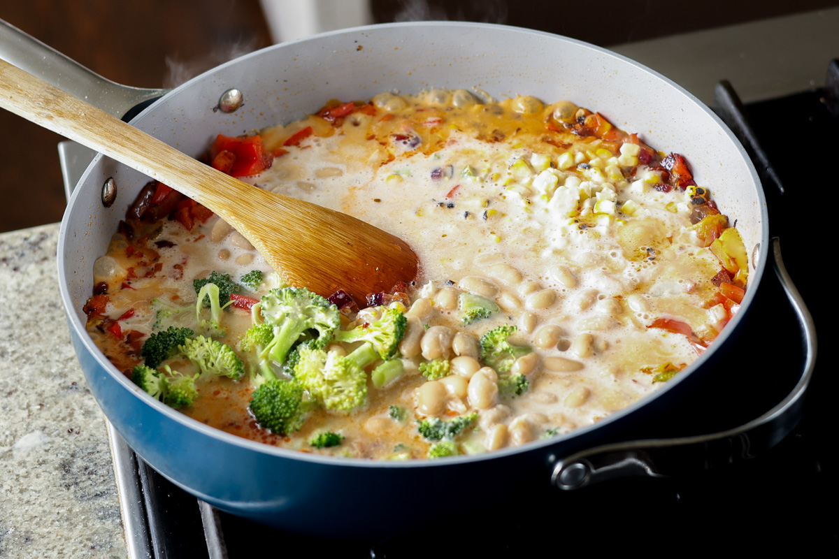 lemon white bean soup in the pan before cooking