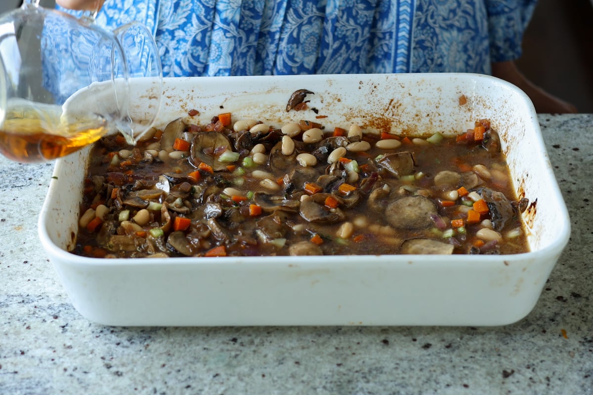 beans and veggies mixed together in the pan