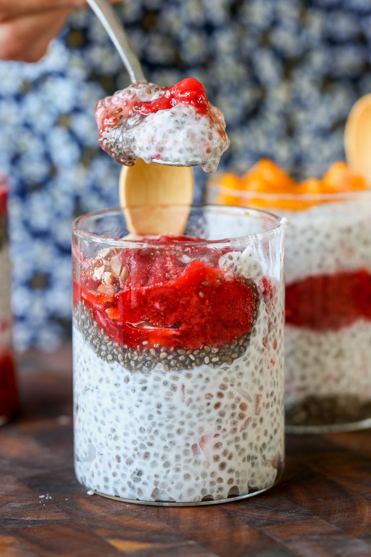spoon taking a bite of strawberry chia pudding
