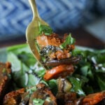 fork with a biteful of sun dried tomato roast