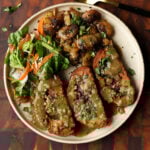 sun dried tomato roast on a plate with salad and mushrooms