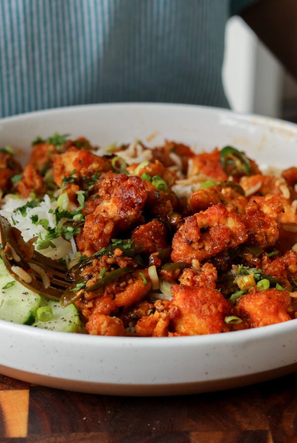apollo tofu on a plate with rice and cucumber