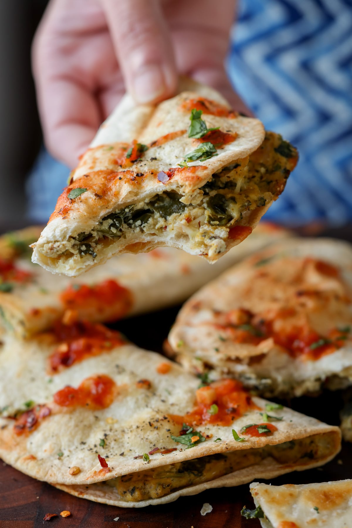 ricotta taco with a bite taken out, so you can see the filling