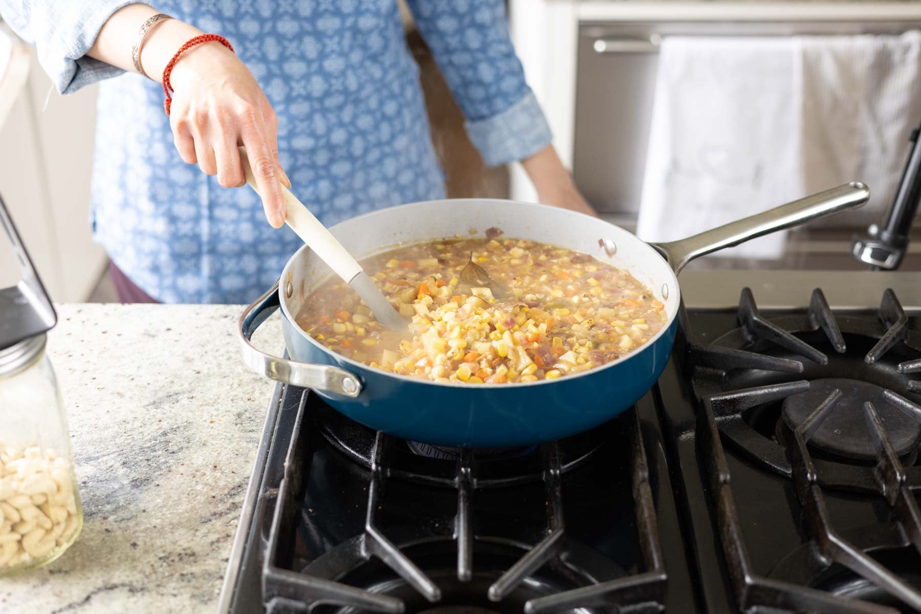 stirring in the potatoes