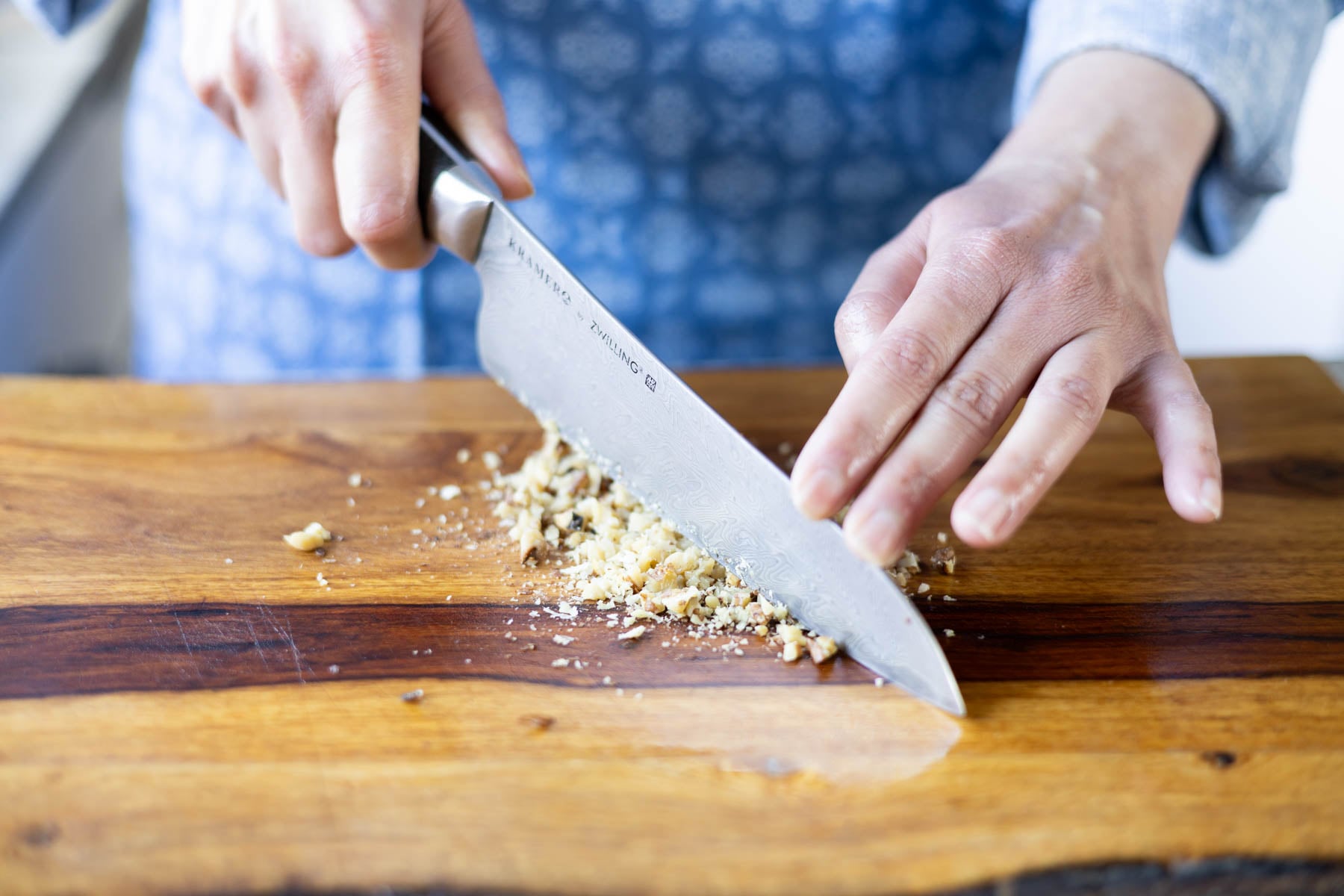 chopping the reserved walnuts