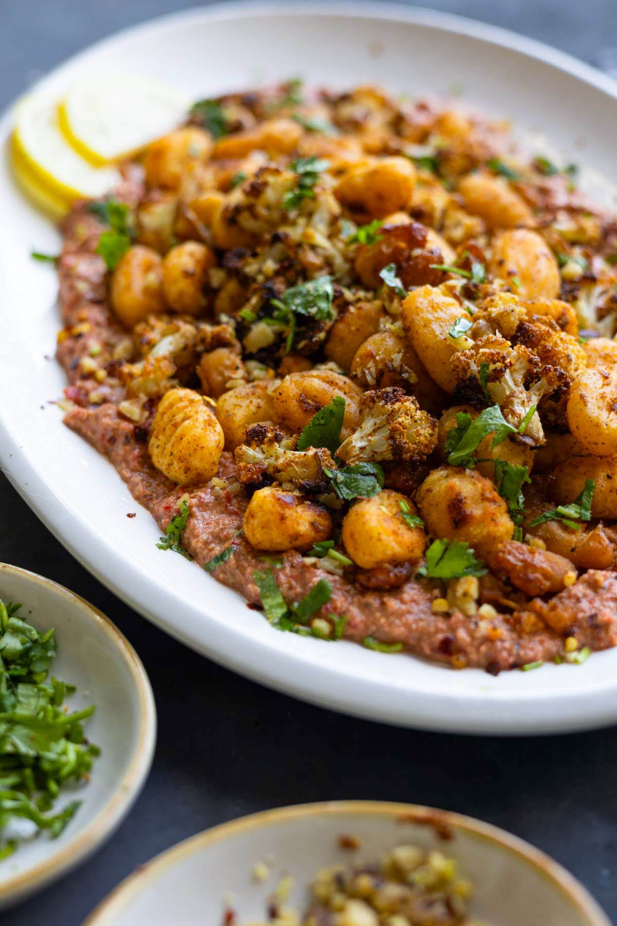 close-up of crispy gnocchi muhammara