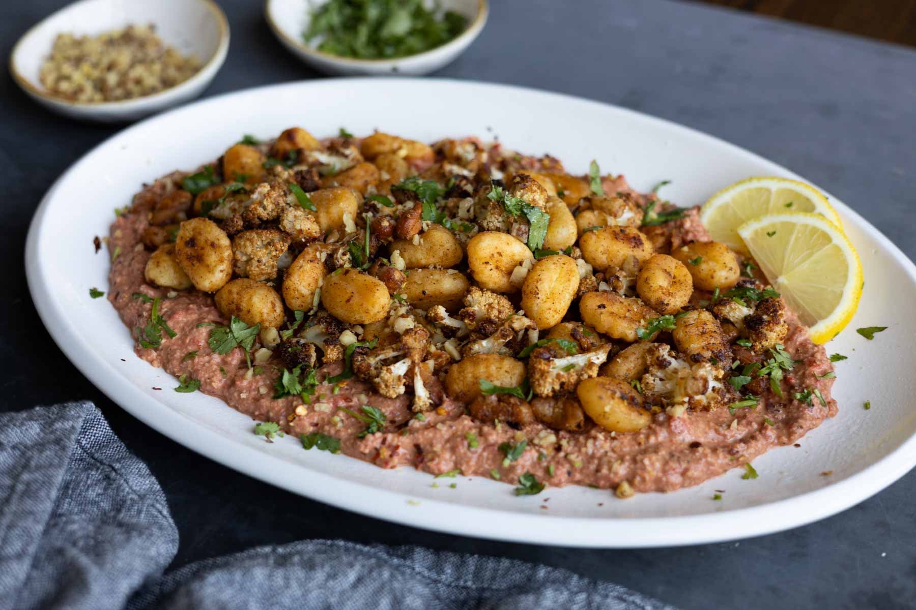 crispy gnocchi muhammara on a plate