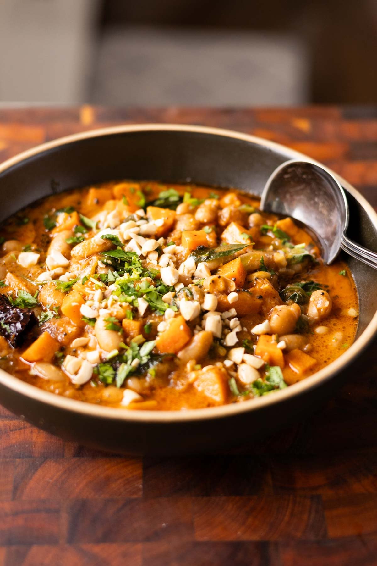 close-up of a bowl of Indian bean and sweet potato stew