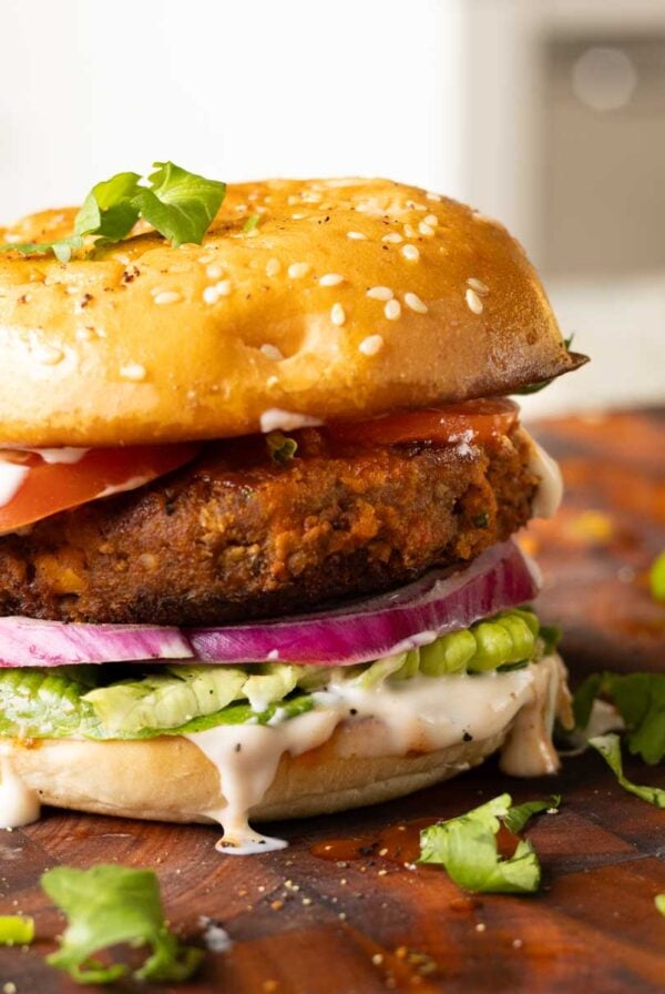 chickpea mushroom burgers on a wooden cutting board