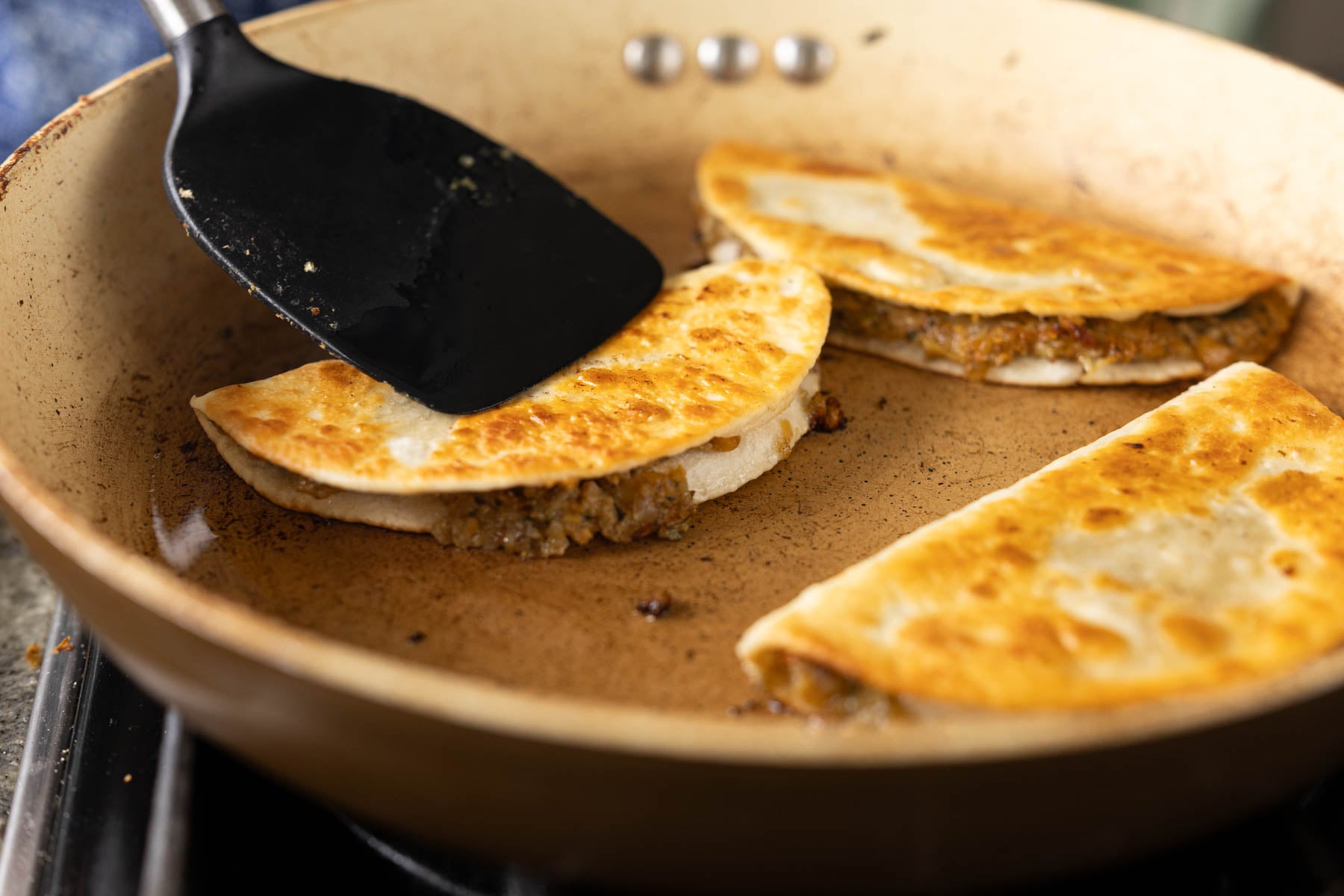 pan frying paratha tacos