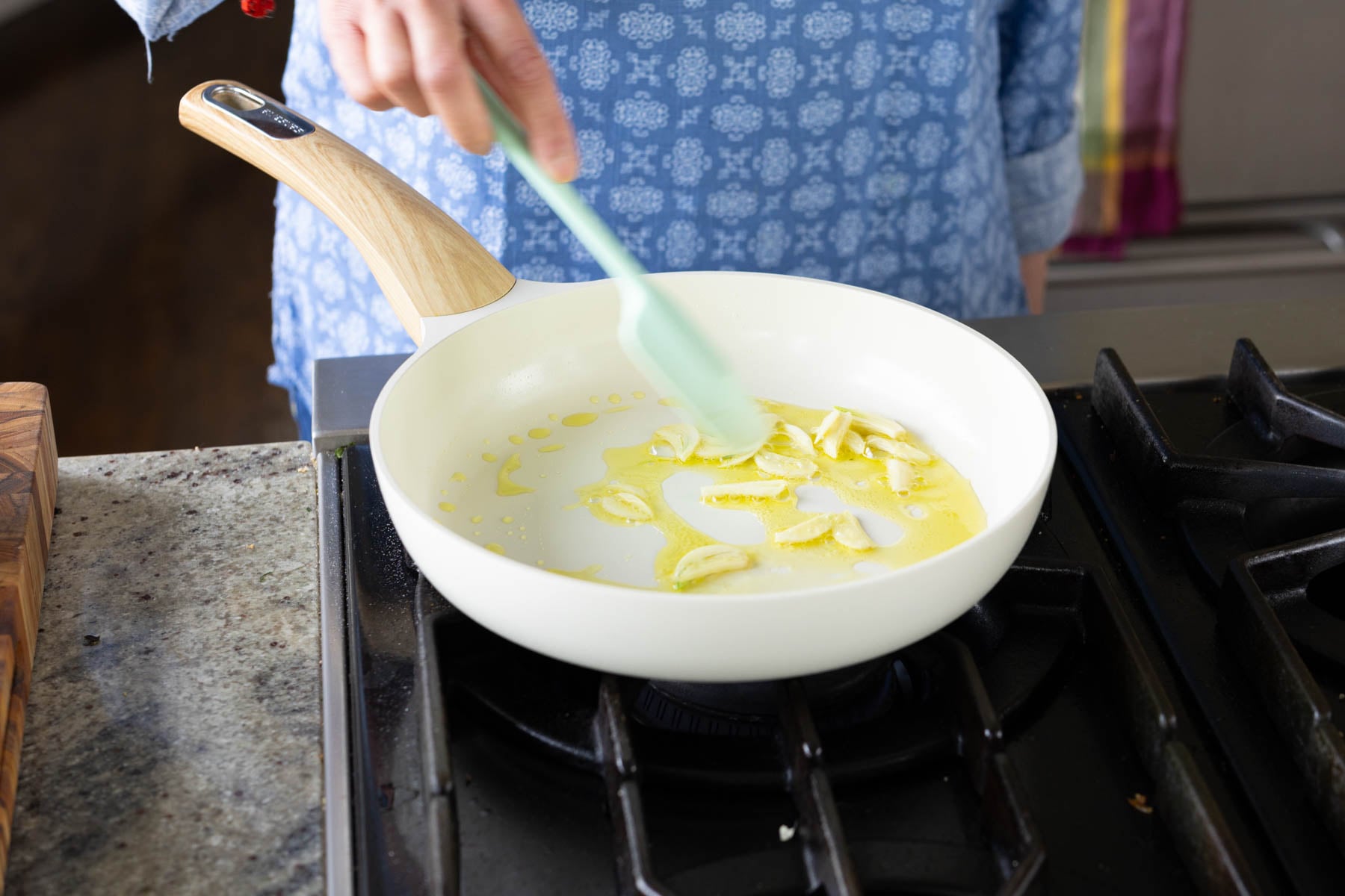 frying garlic in a pan