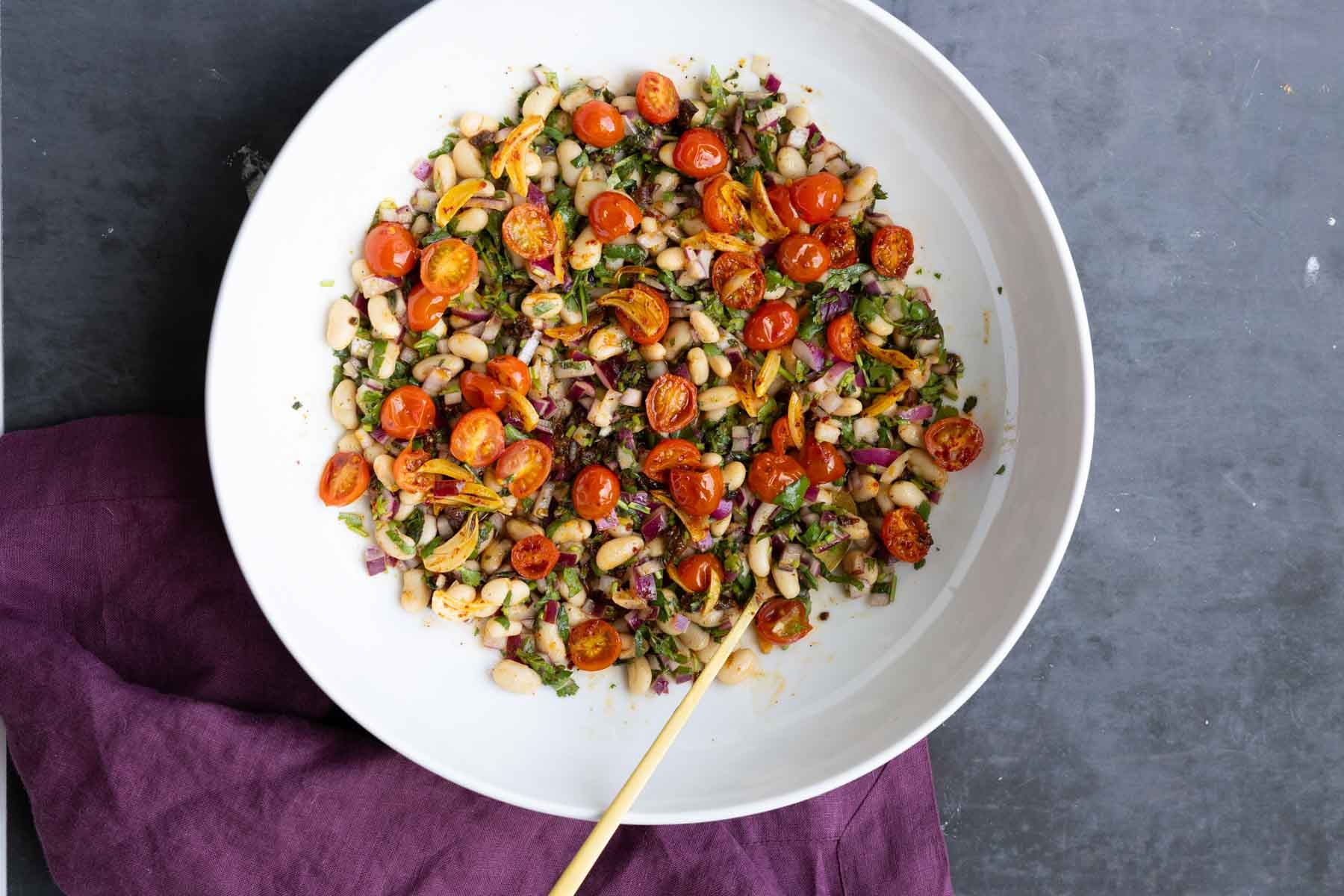 salad bowl after mixing in the tomato and garlic