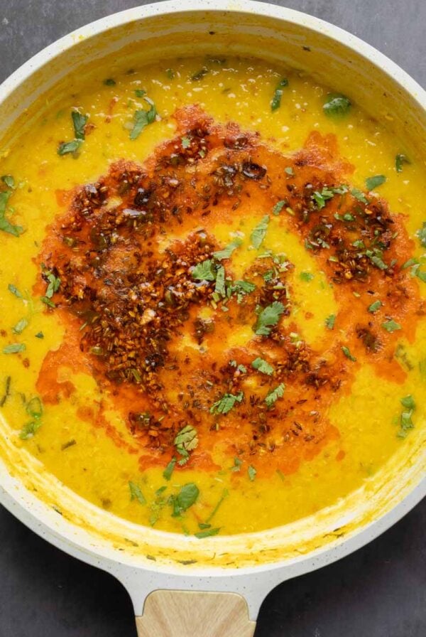 jeera dal in the pan after cooking and adding the spiced oil