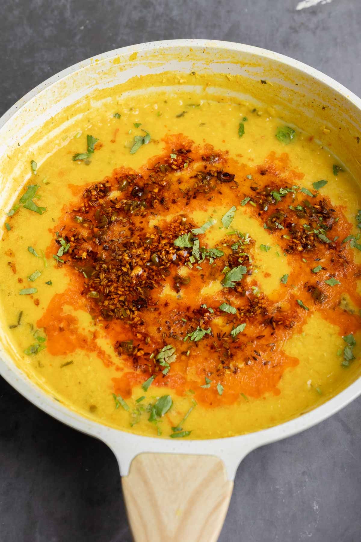 jeera dal in the pan after cooking and adding the spiced oil