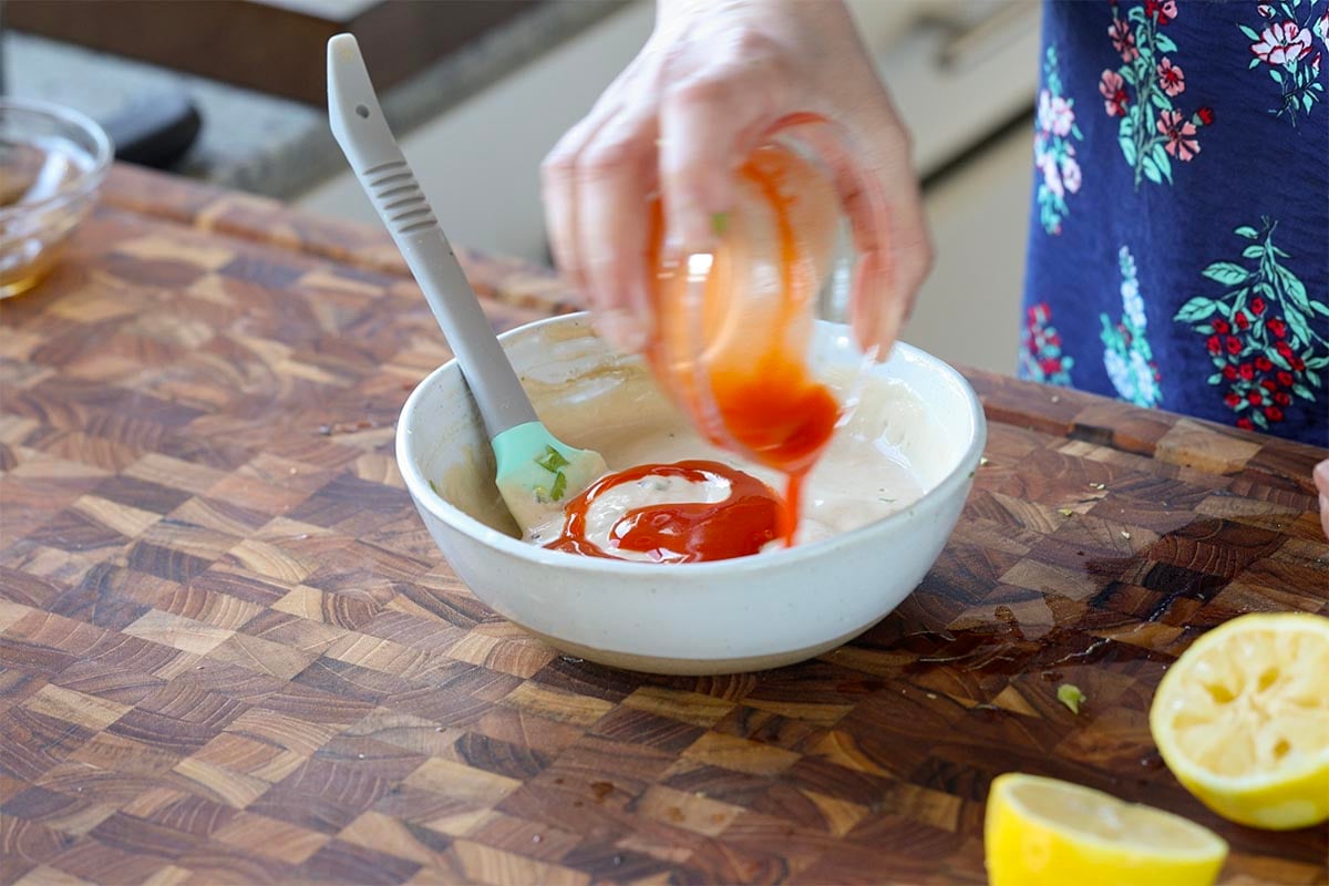 swirling on the hot sauce