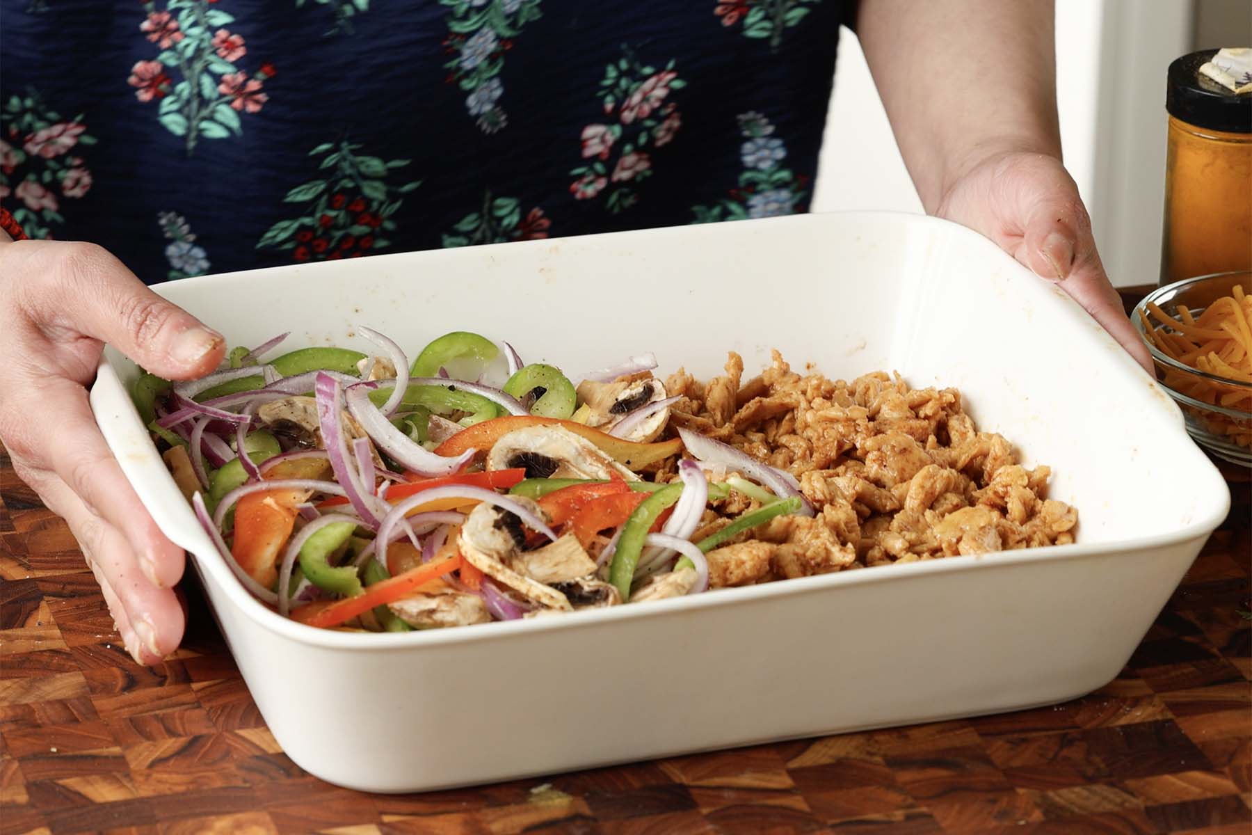 soy curls and veggies in the pan before baking