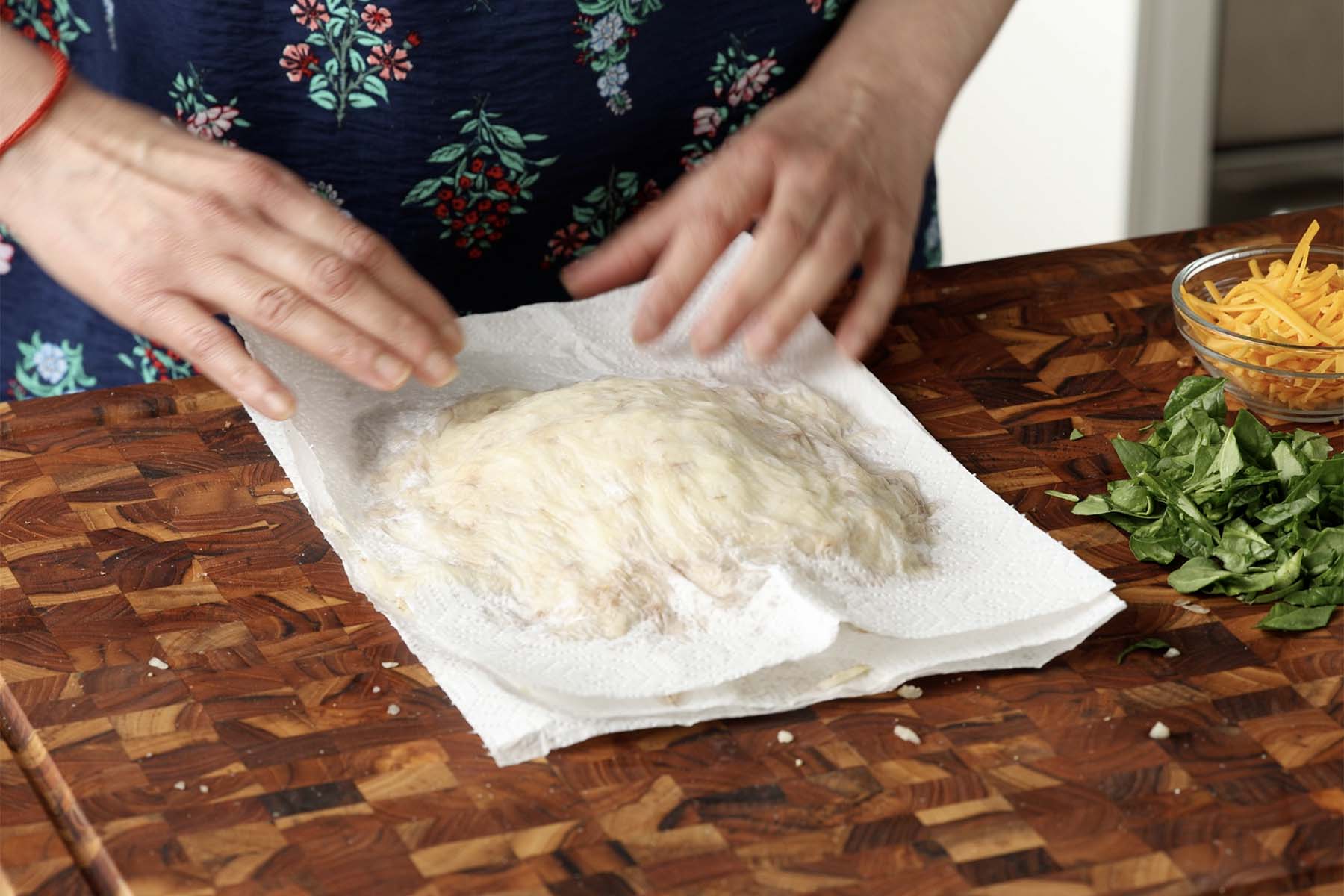 draining the potatoes in a paper towel