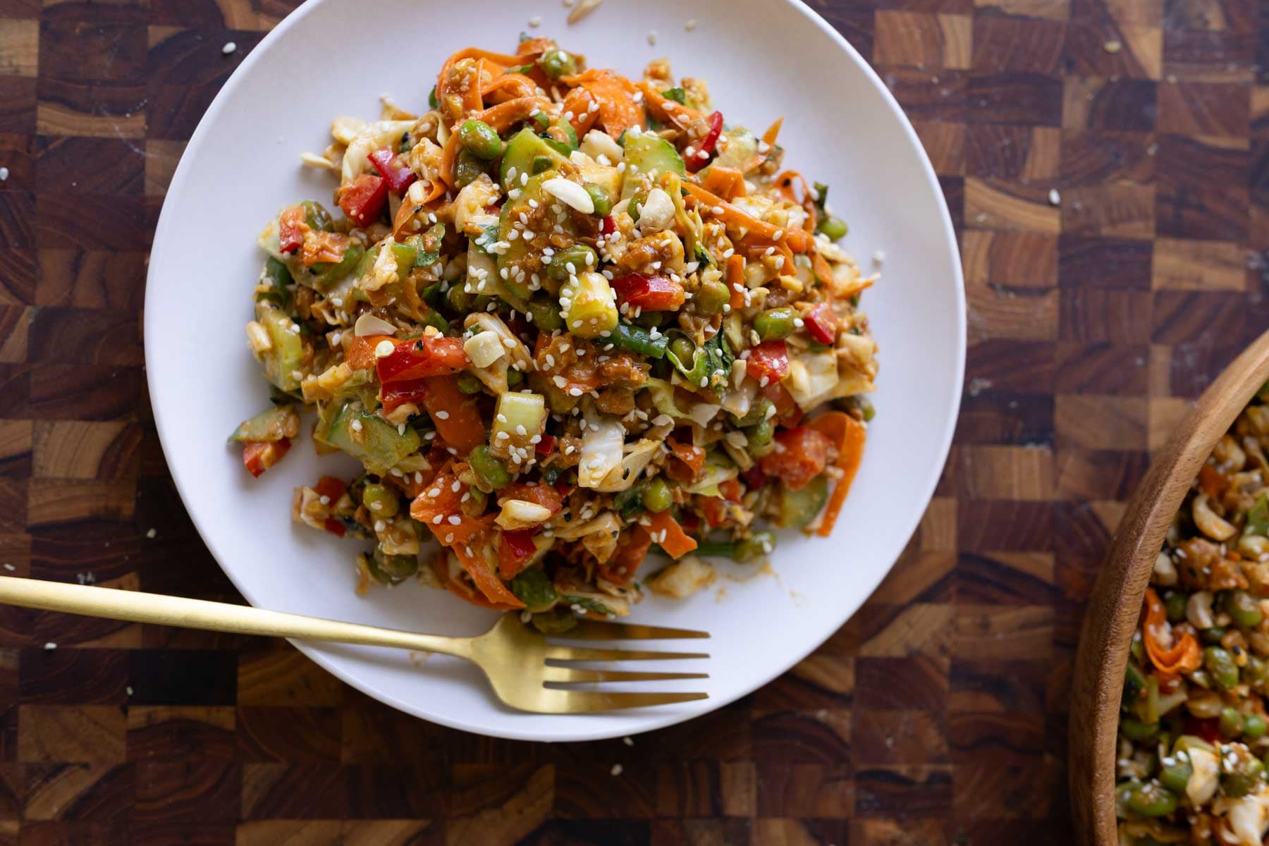 gochujang salad on a plate with a fork