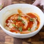 bowl of creamy lemon dressing for the dense bean salad