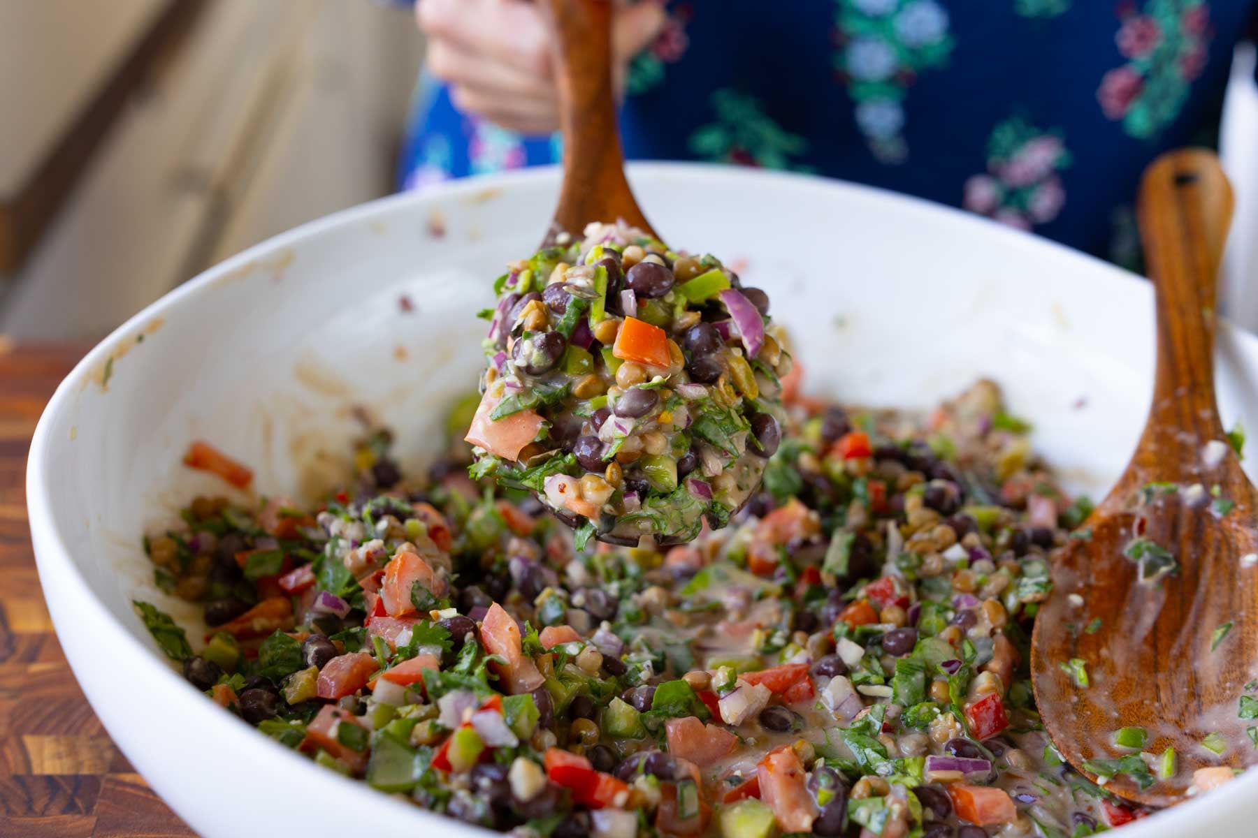 serving spoon of dense bean salad