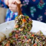 serving spoon of dense bean salad
