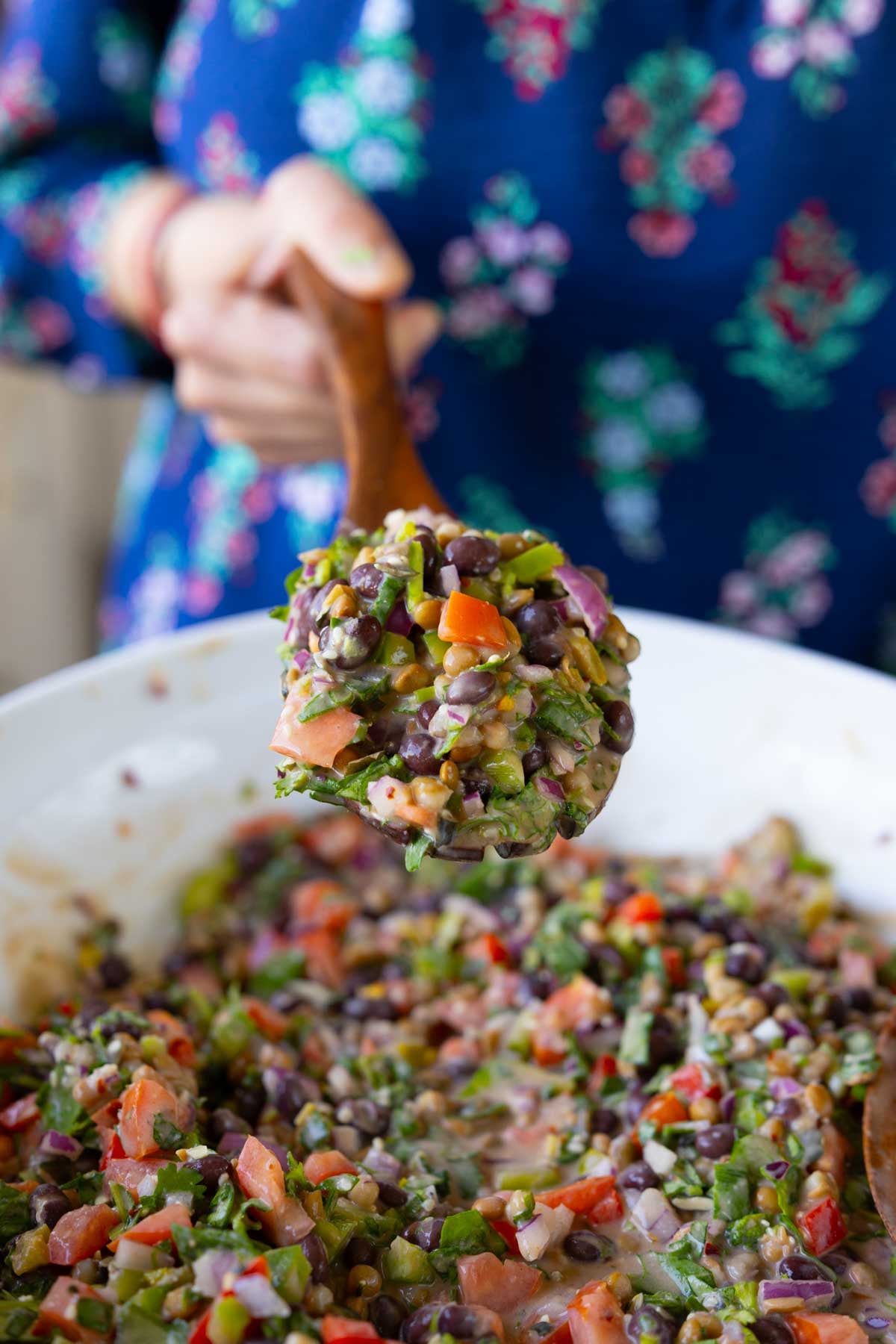serving spoon of dense bean salad