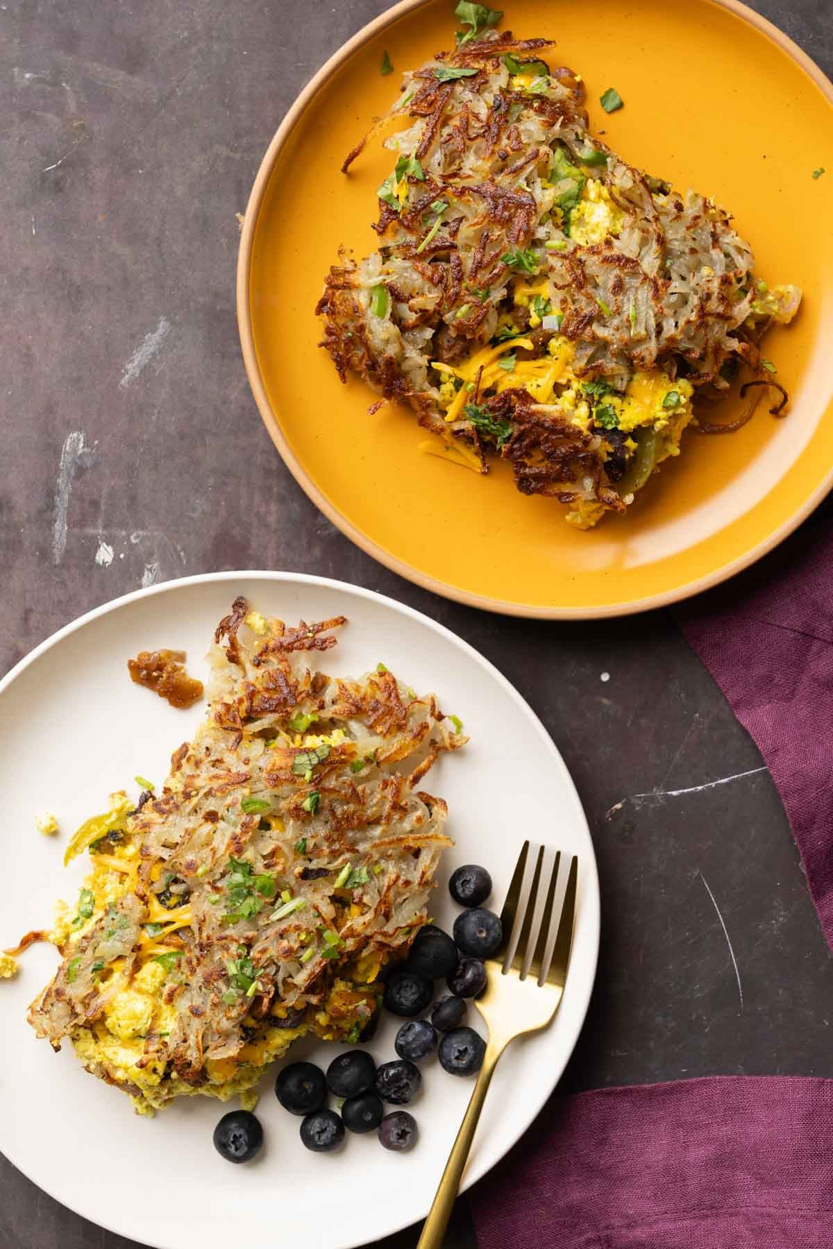 plates with slices of hashbrown casserole on top