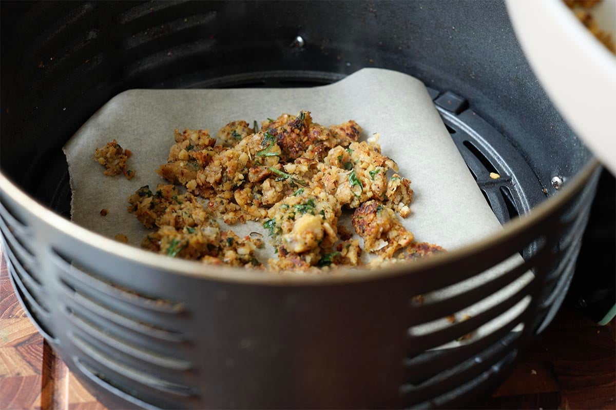 adding chickpea topping to the air fryer
