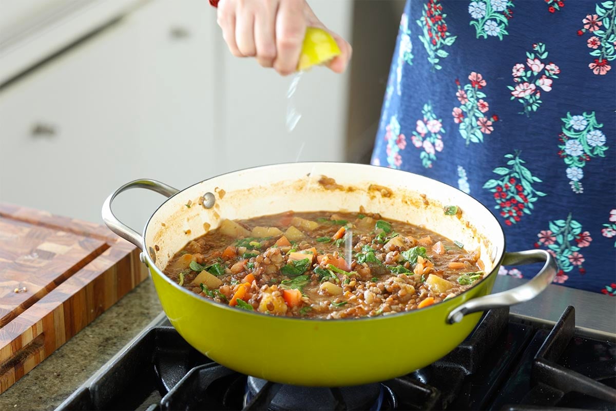adding lemon juice to the pan
