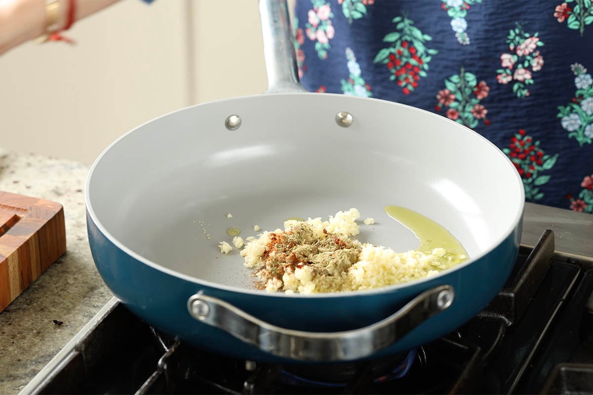 sautéing the aromatics in the pan