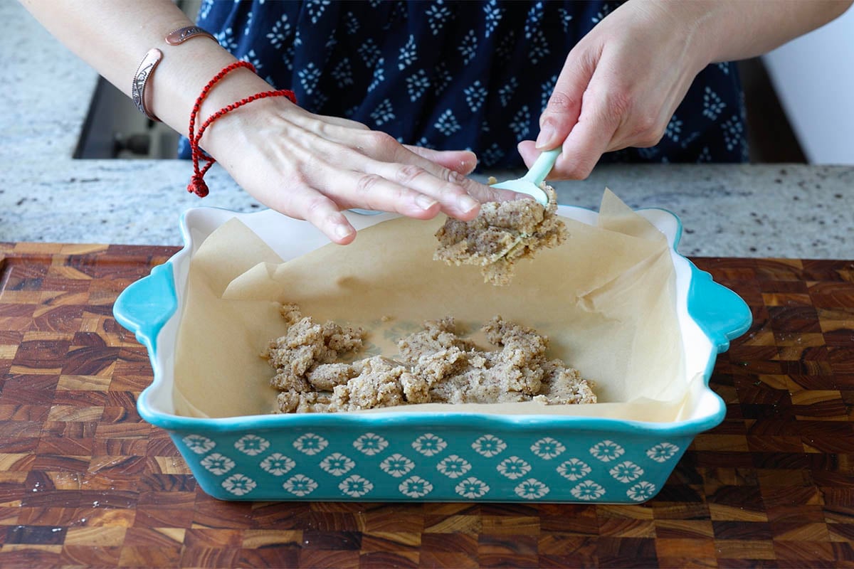 crust dough in the pan before pressing
