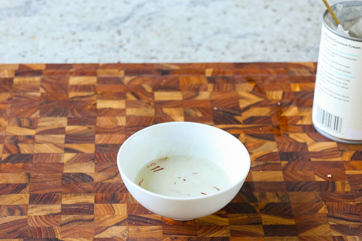 saffron milk steeping in a bowl