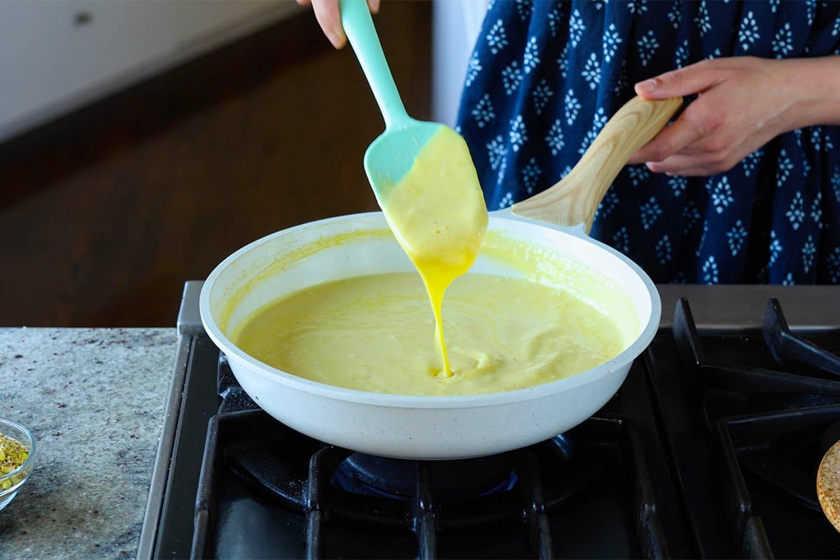 saffron cream in the pan after simmering to thicken