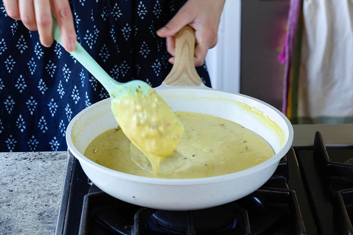 pistachios mixed into the saffron cream