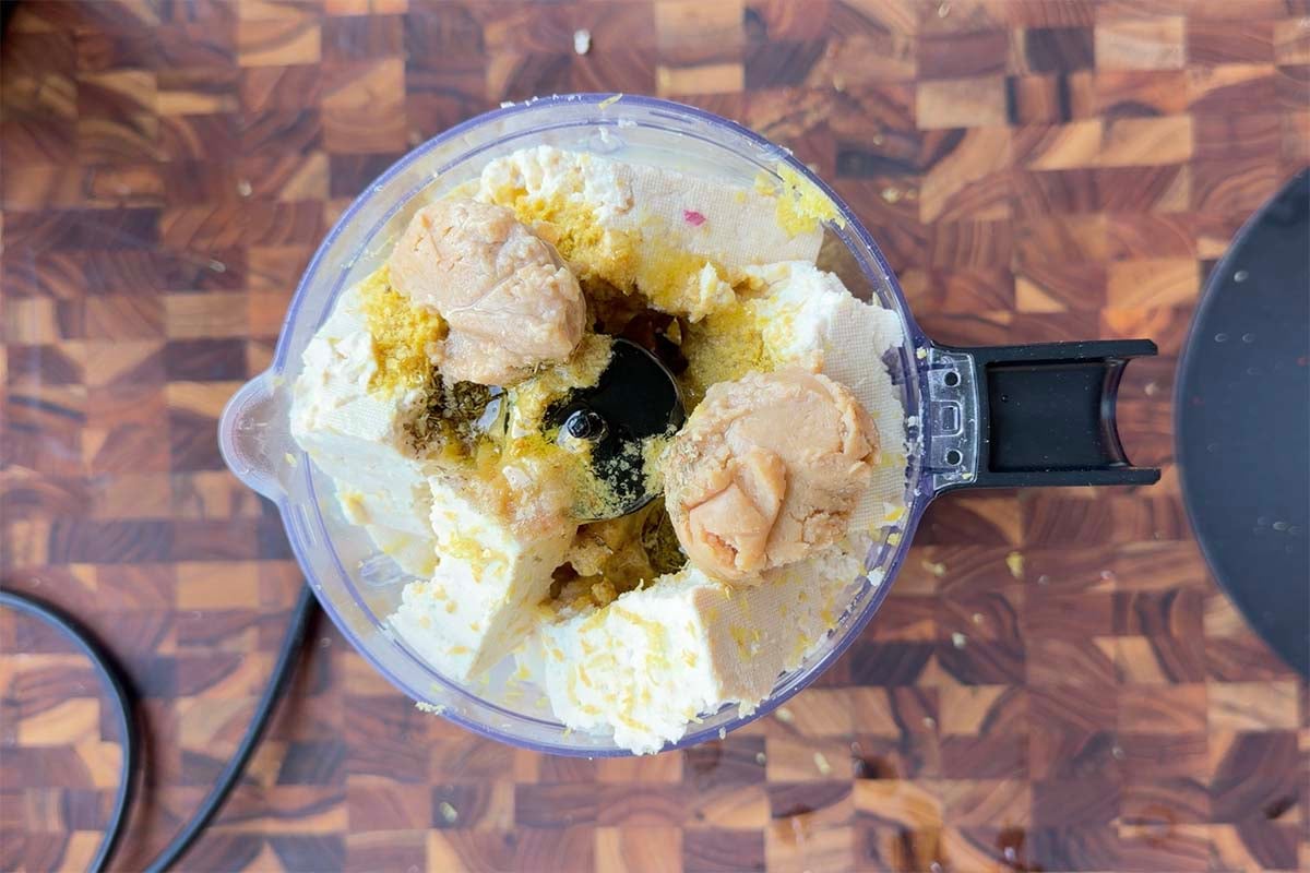 whipped feta ingredients in the food processor before running it