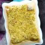 saffron pistachio bars in the pan after chilling