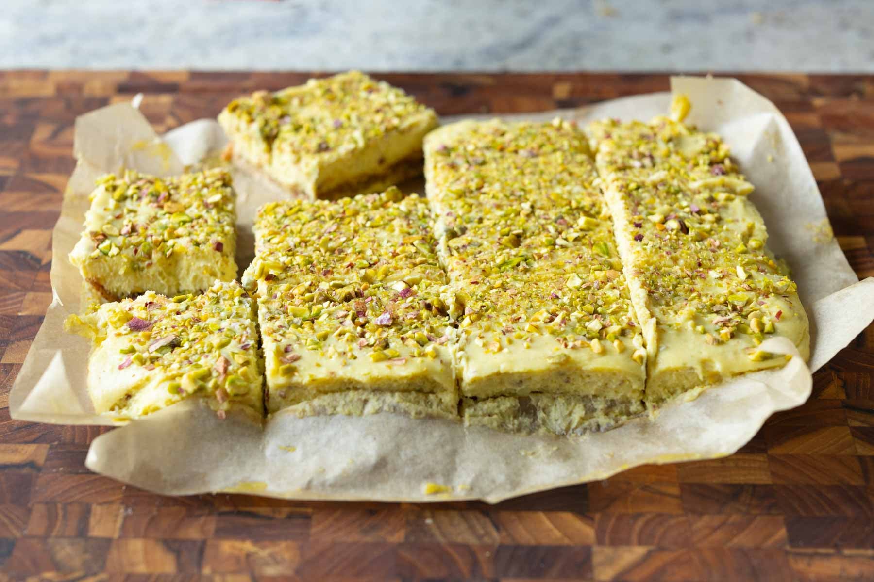 kesar pista bars on the cutting board after slicing