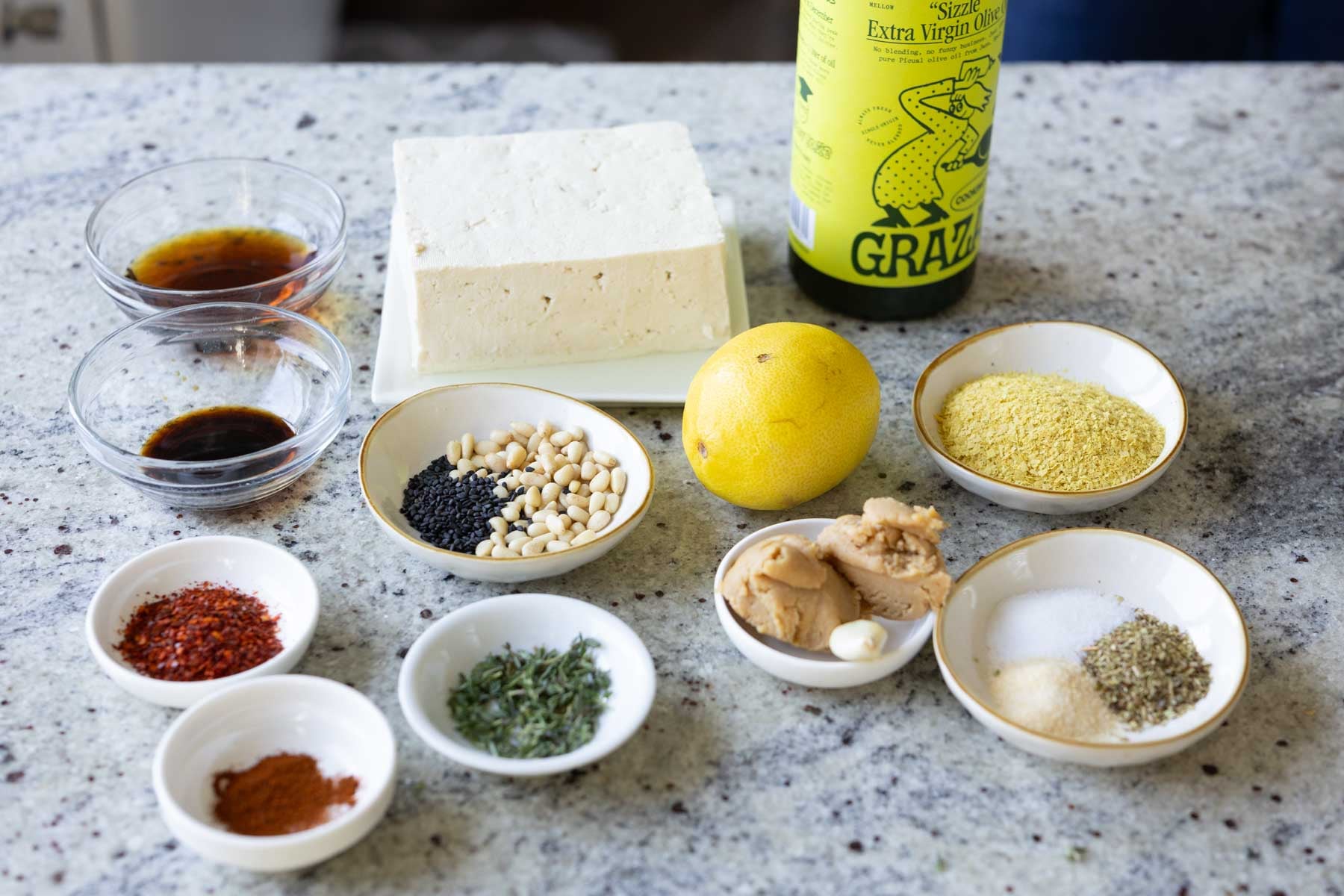 whipped feta ingredients in bowls on the kitchen counter