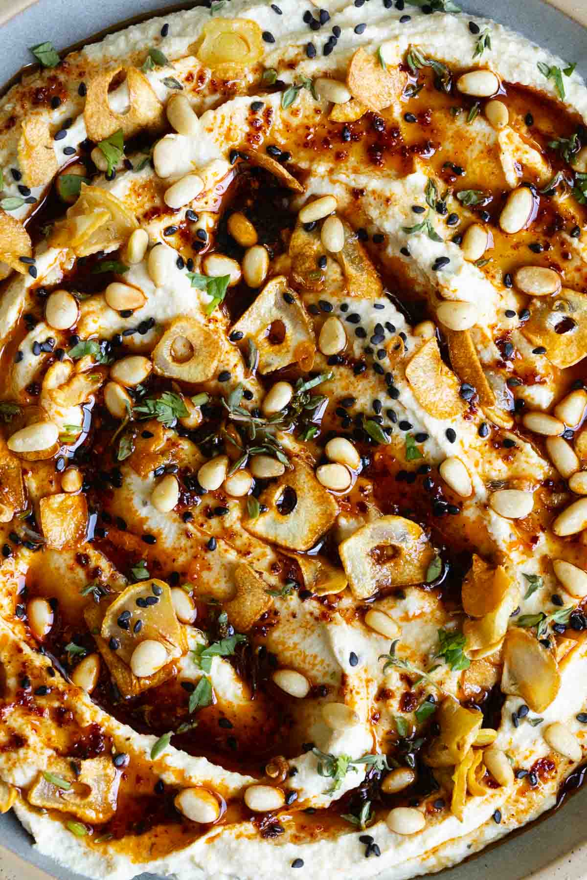 extreme close-up of whipped tofu feta with all of the toppings